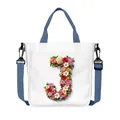 White canvas tote bag with floral letter J print and adjustable blue shoulder strap - Flower Letter J Style(10)