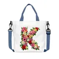 White canvas tote bag featuring floral letter K print with blue detachable strap - Flower Letter K Style(11)