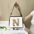 Minimalist polyester tote bag with floral letter N print and black adjustable strap - N14 (Letter N)