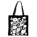 Floral print black polyester tote bag with artistic white flower pattern and shoulder straps - Black Background White Floral (27)