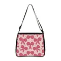Pink underarm bag with bow and heart prints featuring an adjustable black shoulder strap - Large / Pink Bow Hearts (13)