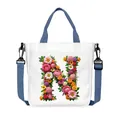 White canvas tote bag with floral letter N print and adjustable navy blue strap - Flower Letter N Style(14)