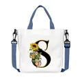 Borsa tote in tela bianca con lettera S a girasole e tracolla blu regolabile - Lettera S(S19)