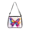 White shoulder bag featuring artistic colorful butterfly print and black strap - Splash Spray Multi-Color Butterfly (18)