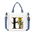 Borsa tote in tela bianca con manici blu e stampa floreale con lettera H e girasole - Lettera H(H08)