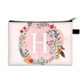 Pink makeup bag with floral wreath and letter H print, features black zipper closure - Letter H Style / Large
