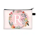 Pink cosmetics bag with zipper featuring a floral wreath and letter R printed design - Letter R Style / Large