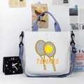 White canvas tennis bag with blue handles and detachable shoulder strap for sports - Classic Tennis Letters Style (03)