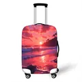 Elastic suitcase cover with sunset beach print and four black spinner wheels - S / Orange-Pink Sunset Seascape