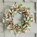 Close-up of autumn wreath with green eucalyptus leaves, mini pumpkins and berries - Basic Wreath Style (WSJ0024)