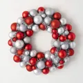 Classic red and silver Christmas wreath with matte and glitter baubles for festive decor - Red & Silver