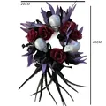 Halloween wreath with silver skulls, dark red roses, and black feathers 40cm high - Skull Wreath