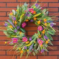 Artificial lavender wreath with colorful spring flowers hanging on a red brick wall - Vibrant Multi-colored Wreath Style (A085)