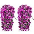 Close-up of two artificial purple bougainvillea hanging plants with green leaves - Magenta Pink