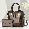 Brown crocodile pattern faux leather handbag set with gold hardware and tassel charm - Coffee