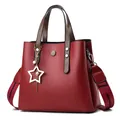 Dark red matte PU leather bucket bag with brown handles and star tassel charm - Upgraded Charm Version / Burgundy