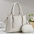 Chic beige tote bag with woven texture and matching coin purse on display - Off White