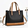 Chic two-tone black and brown lychee grain leather tote bag with top handle and strap - Black