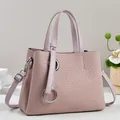 Pink woven texture tote bag with silver rings and adjustable shoulder strap - Pink