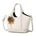 Minimalist beige woven tote bag with a cute plush bear pendant and adjustable strap - Off White