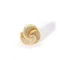 Macro detail of gold spiral ring with pavé-set zircons and round center diamond - Open Adjustable / Spiral Flower Cluster Style (W-816-1)
