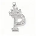 Silver tone cubic zirconia crown letter P pendant close up, shiny stone inlay jewelry detail view. - Letter P