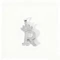 Close-up detail of silver zircon encrusted letter R crown pendant, sparkling stone texture. - Letter R