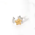 Detailed macro view of geometric floral ring featuring gold and silver bicolor finish - Small Floral Wrap Style (33-DQ-W-1806)