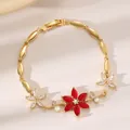 Makroaufnahme: Vergoldetes Blattarmband mit roten Zirkonia-Blüten und Schmuckschließe - Roter und Klarer Blumen Gold Stil (DQ-W-2993 Stil 5) / 19cm