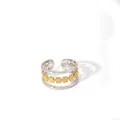 Macro view of gold flower pattern layered between two silver rings in two-tone design - Silver Fine Ring Golden Flower (42-DQ-W-1806)