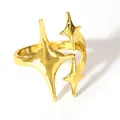 Detailed view of gold plated ring featuring three polished four-pointed star charms - Open Adjustable / Gold