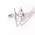 Minimalist silver star ring featuring three polished four-pointed stars on white background - Open Adjustable / Silver