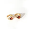 Close-up of gold stainless steel hoop earrings with orange pear-cut stones and zircon halo - 4--DQ-W-2156 Coffee