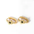 Macro detail of 18K gold-plated clover hoop earrings with black stone and pave crystals - 4-DQ-W-1945