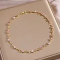Elegante goldene Blattranken-Halskette mit funkelnden rosa Zirkonia auf Seide - Rosa Edelstein Goldrebe Halskette Stil (XL-3388)