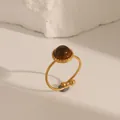 Vintage stainless steel ring featuring a round brown gemstone inlay and gold finish - Open Adjustable / Tiger Eye Stone Color