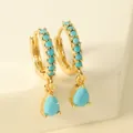 Detailed view of gold-plated hoop earrings with turquoise beads and teardrop pendants - Blue Water Drop