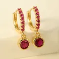 Detail of gold earrings with pavé red zircon hoops and round synthetic ruby drops - Rose Red Round