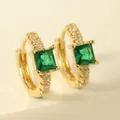 Macro view of gold hoop earrings with square green stone and clear cubic zirconia - Green Square