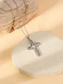 Close-up detail of the elegant cross pendant necklace with sparkling colorful stones. - W1501 Cross Style 6