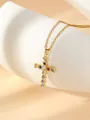 Close-up detail shot of a gold plated stainless steel cross pendant necklace with colorful stones. - W1497 Cross Style 14