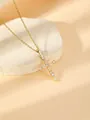 Gold-plated stainless steel cross pendant necklace detail, sparkling zircon stones close-up - W1736 Cross Style 24