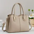 Elegante beige handtas met litchi-textuur en afneembare schouderriem voor dames - Lichtbeige