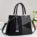 Retro black denim Boston bag with leather patchwork and silver hardware for women - Black
