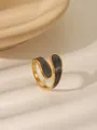 Macro detail of golden bypass ring with marble enamel inlay on a textured tray - Bypass Style - Gray Marble Pattern (W1046A)