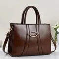Fashion dark brown leather tote bag with gold buckle and adjustable strap for women - Coffee