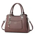 Fashionable mauve large capacity crossbody bag with detachable strap and elegant pendant - Purple