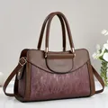 Detail of elegant two-tone brown tote bag featuring textured panels and gold metal hardware - L30 W13 H20 Handle16 / Red