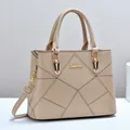 Beige gewatteerde leren handtas met gouden hardware en verstelbare schouderriem dames - Khaki