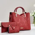 Deep red three-piece tote bag set with vertical texture and golden hardware accents - 23cmx11cmx19cm / Handbag With Clutch And Pouch / Red